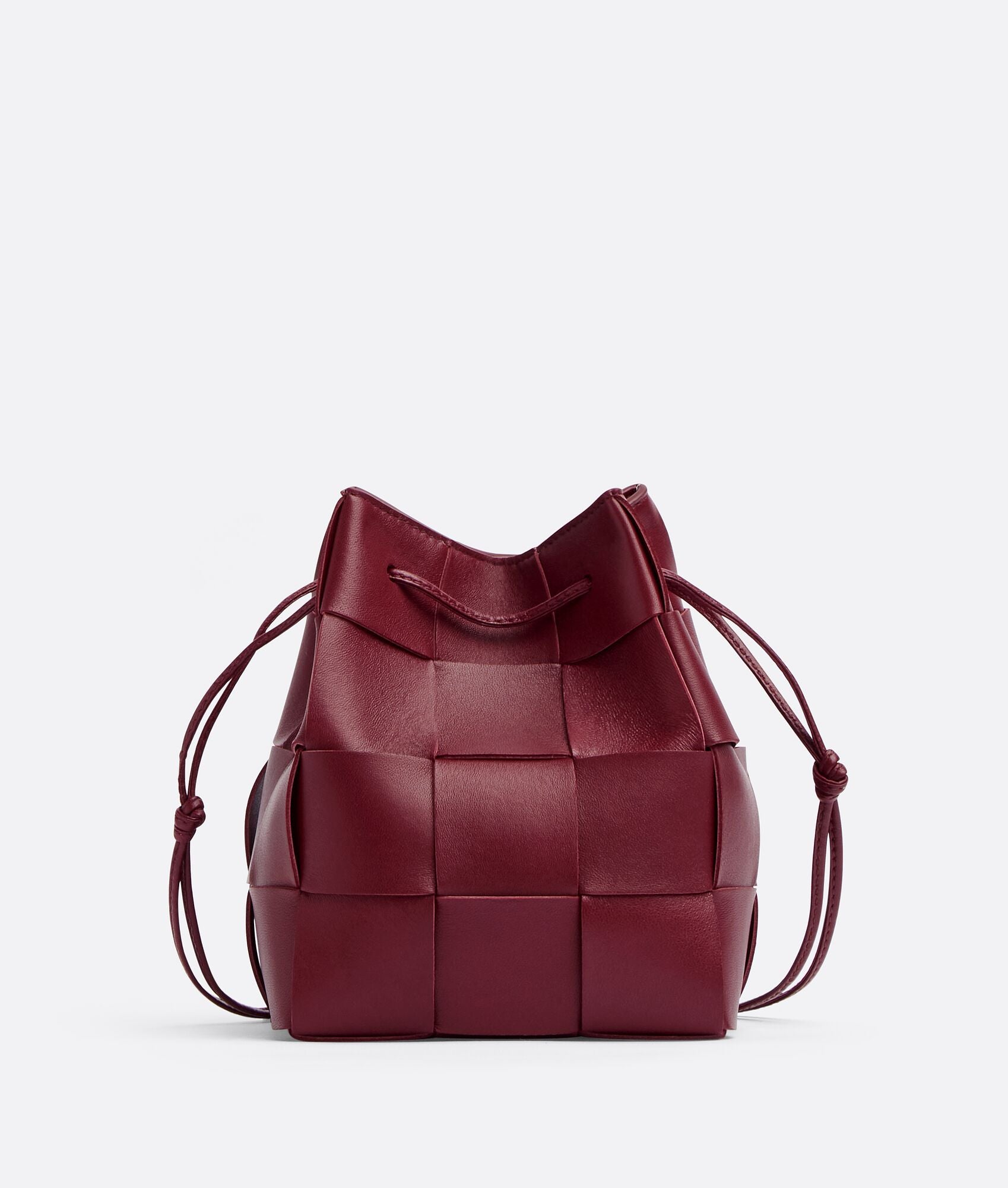 Small Cassette Cross-Body Bucket
“Bordeaux”