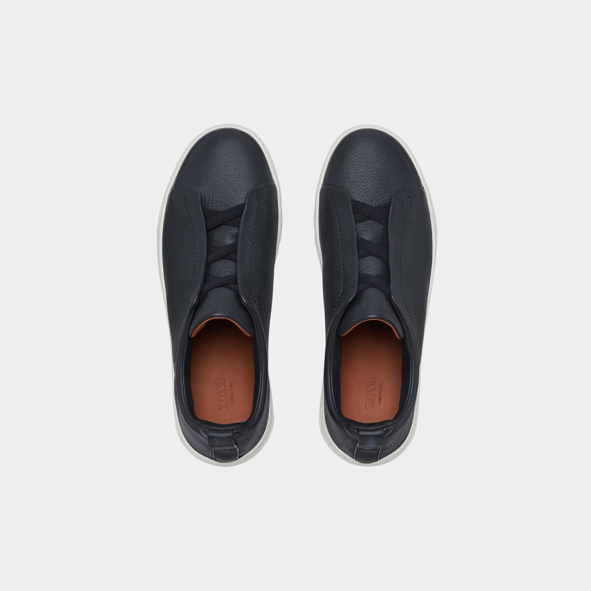 Deerskin Triple Stitch Low Top Sneakers
