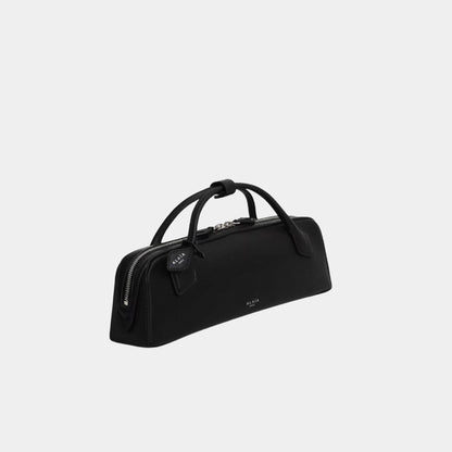 Le Teckel Clutch in Shiny Goatskin