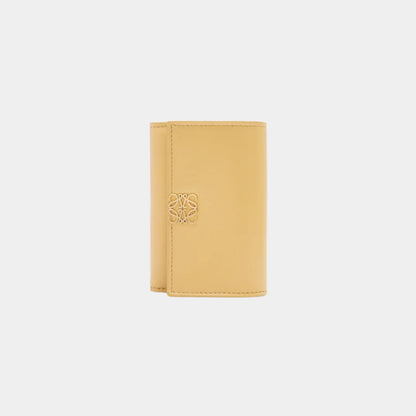 Puffer Anagram Small Vertical Wallet In Shiny Nappa Calfskin